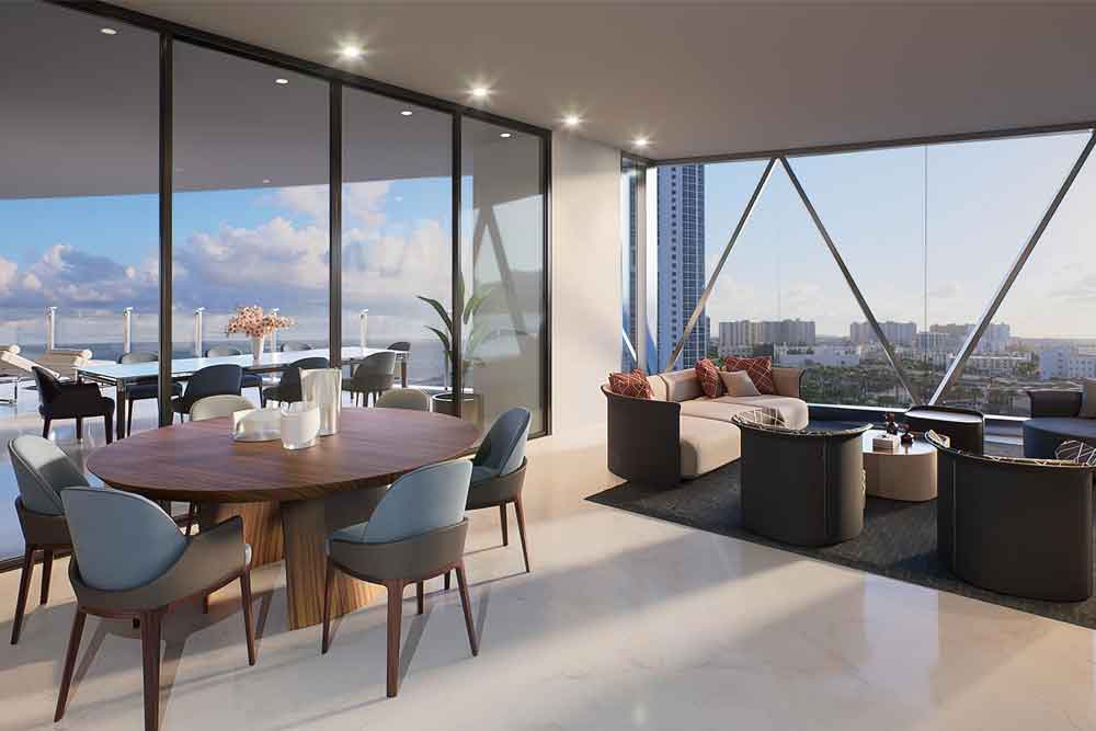 Drone view of a sail boat in the Atlantic ocean under big clouds